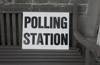 Polling Station sign placed on park bench Photo by Steve Houghton-Burnett on Unsplash